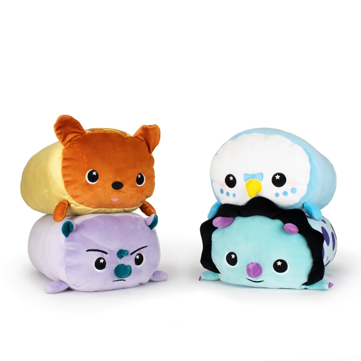 The Limited Edition Bundle - 4 Pack includes four soft, rectangular Moosh-Moosh plushies—a fox, purple cat, white-and-blue bird, and blue creature with antennae—stackable for sensory softness and cuddly fun.