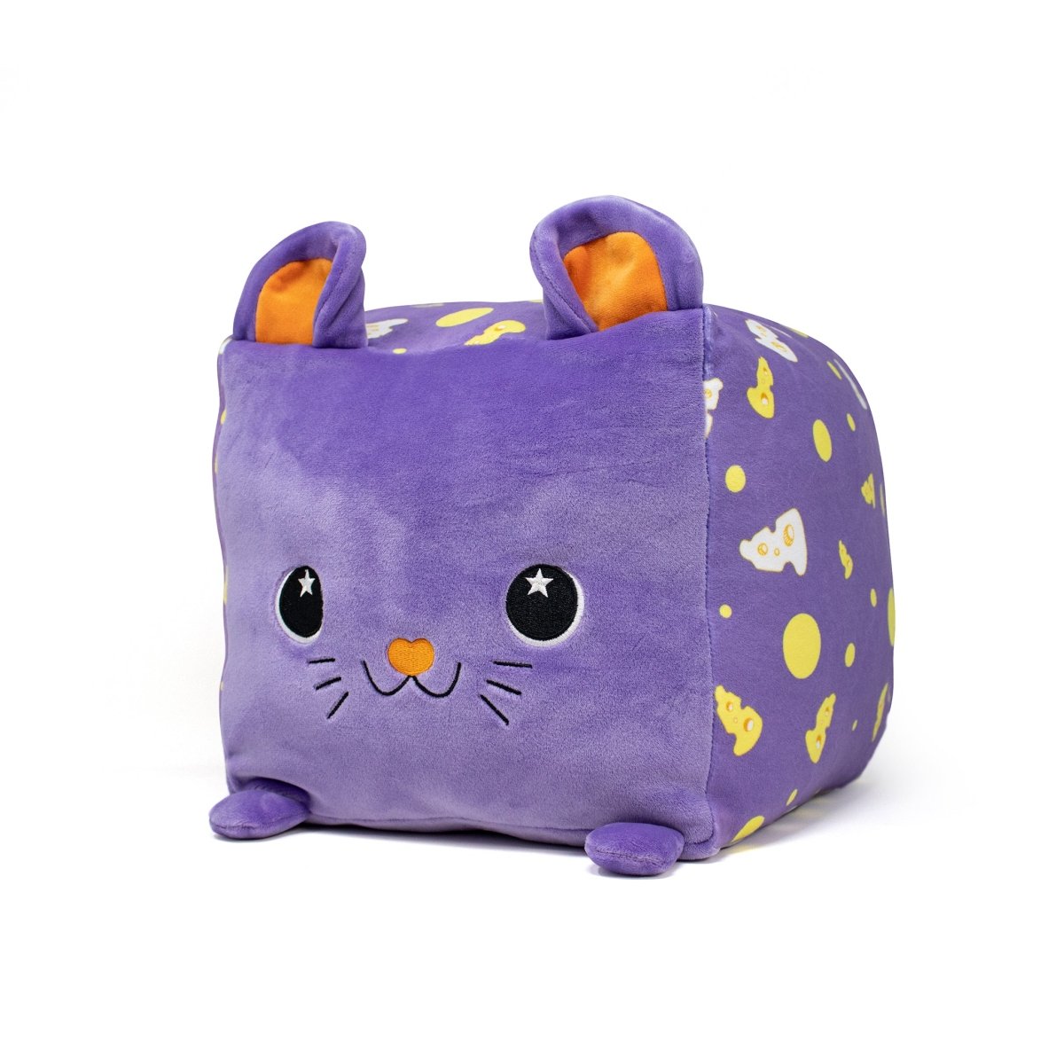 Cheddar the Mouse Plushie: A lavender cube-shaped plush with small paws, ears, a happy face, orange nose and ears, and cheese and moon patterns on its sides. It sits adorably against a plain white background.