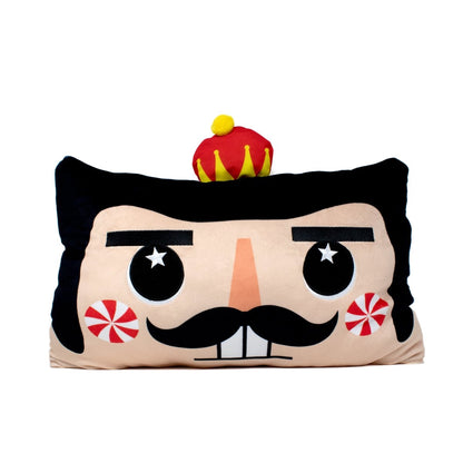 Stuart the Nutcracker Pillow features a cartoon nutcracker face with a black mustache, peppermint-swirled cheeks, and a bright crown—perfect for cozy snuggles or adding festive charm to your holiday décor.