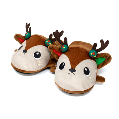 Mitzy the Reindeer Slippers are cute plush slippers with adorable reindeer faces, antlers, and festive decorations. They feature a soft brown design with beige accents and round, sparkling eyes, making them perfect for cozy holiday-themed wear.