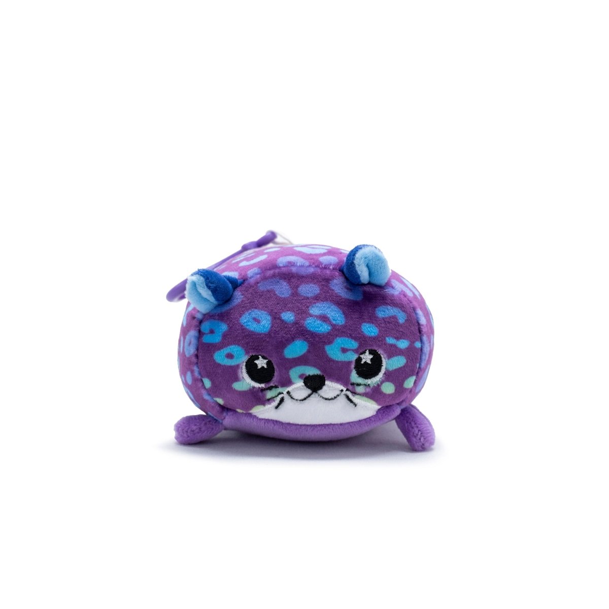 This adorable Rayn the Leopard plush clip-on from Moosh-Moosh Series 5 is a cute, small toy resembling a purple otter with blue spots. It has a round body, small blue ears, and cartoonish facial features with a friendly expression against a plain white background.