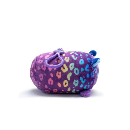 Rayn the Leopard Plush Clip-On is a small, round plushie with a purple base and multicolored spots, featuring tiny blue ears, a tail, and a hanging loop. This cute toy resembles an abstract animal from the Moosh-Moosh Series 5 collection.