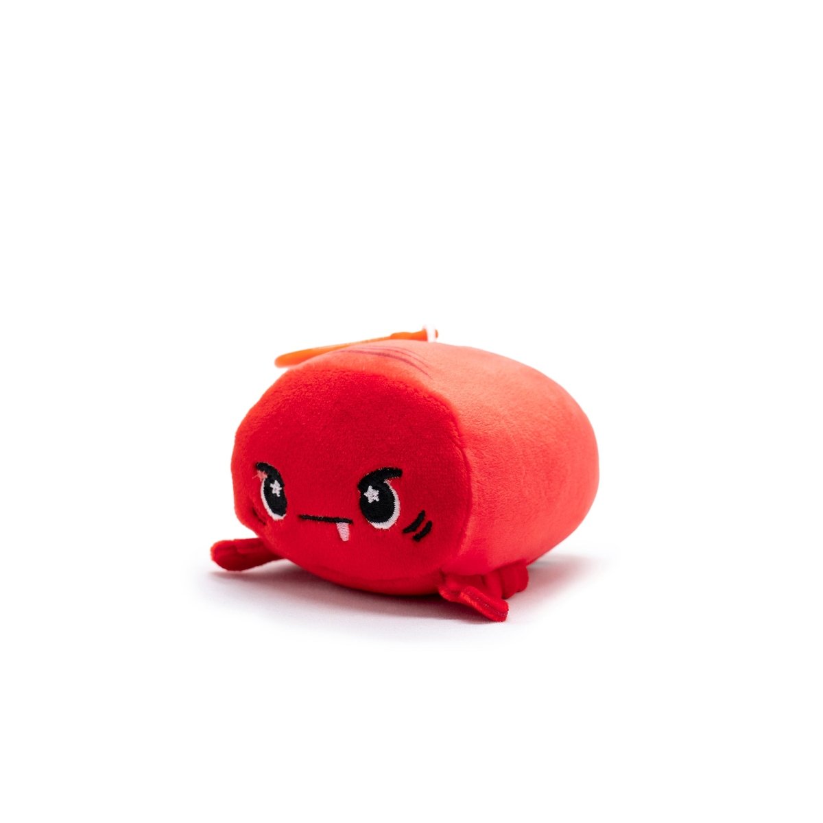 Meet Sebbie the Crab Plush Clip-On—a round, red plushie from the Moosh-Moosh Series with an animated face, expressive eyes, a small frown, and two tiny claws. It features an orange tag on top and appears against a plain white background.