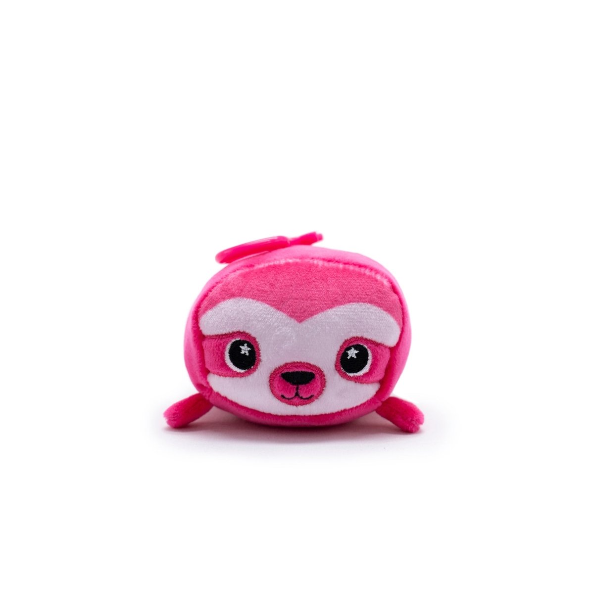 Meet Turbo the Sloth Plush Clip-On, a pink Moosh-Moosh Series 5 plush with big eyes, a small smile, lighter pink facial markings, and tiny limbs. This adorable clip-on adds charm to any setting against its soft white backdrop.