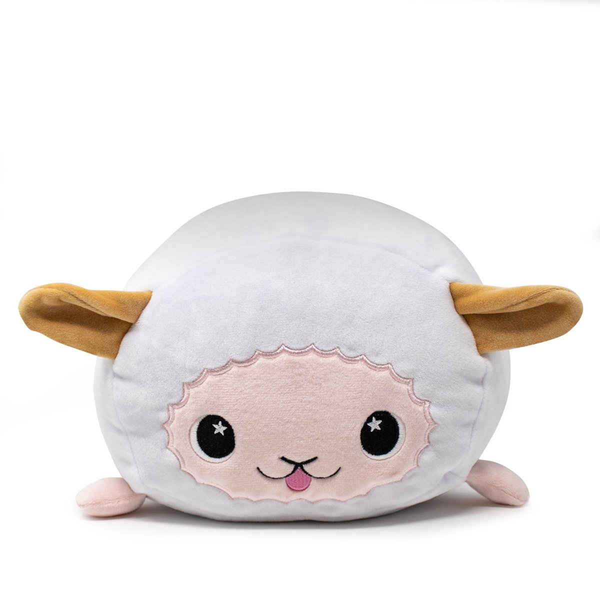 Cookie the Lamb Plushie is a cute, soft stuffed animal with a round body, pink face featuring stitched black eyes and a small tongue sticking out, and yellow ears. It is pictured resting on a white surface.