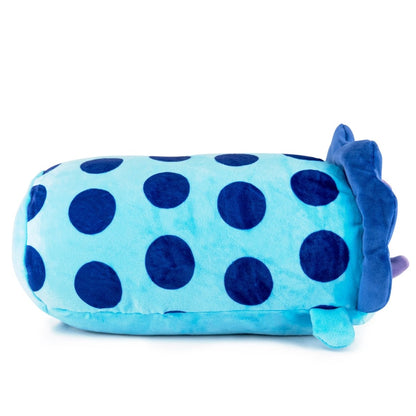 Meet "Dina the Dinosaur," a charming plush toy designed as a light blue cylinder with dark blue polka dots. It boasts decorative elements in blue and purple that mimic whimsical creature ears and feet, making it an adorable collectible for fans.