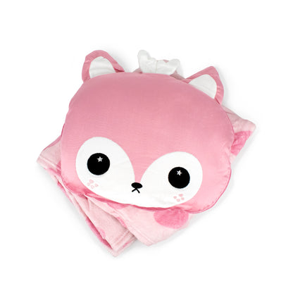 The 2-in-1 Pillow Blanket - Doe the Deer is a pink plush pillow featuring a cute deer face with big eyes and small ears, resting on a matching kids fleece blanket, with a white tissue emerging from the pillow top.