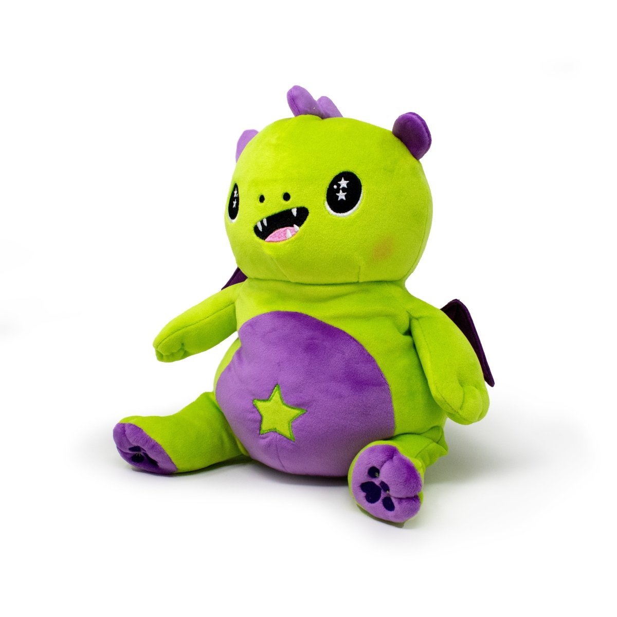 Drac the Dragon Starlight Buddy Plushie is an adorable upright plush toy with a bright green body, purple accents, starry eyes, a purple belly, small wings, and playful paw prints on its feet.