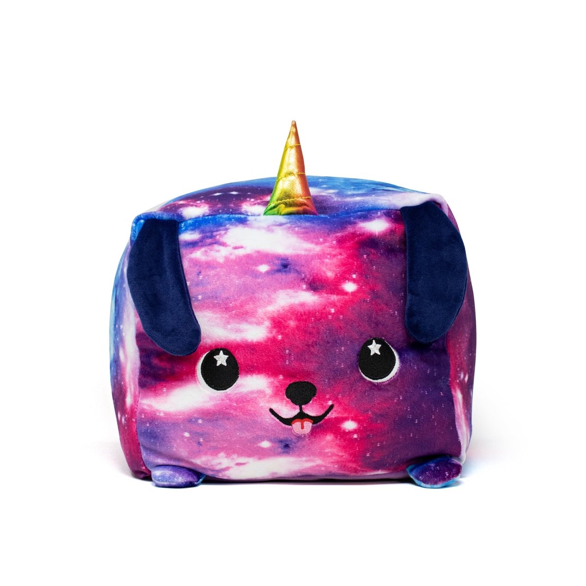 The Dream the Puppicorn Plushie is a cube-shaped toy with a galaxy print, featuring soft blue ears, star-dotted black eyes, a tiny nose, and a smiling mouth with a pink tongue. A golden unicorn horn tops this cute stuffed animal, making it an adorable addition to any collection.