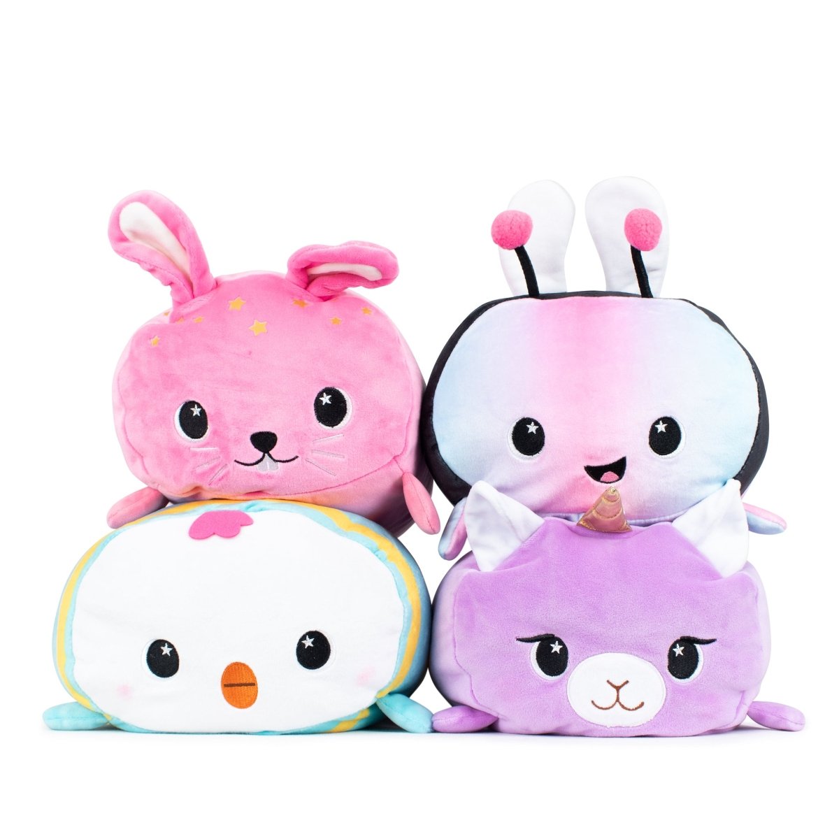 A pink star-patterned bunny, a multicolored insect with antennae, a white-yellow creature with blue accents, and Lila the Purple Llamacorn Plushie form a plush pyramid. Perfect Easter Basket Buddies, each features ultra-soft material and large expressive eyes.