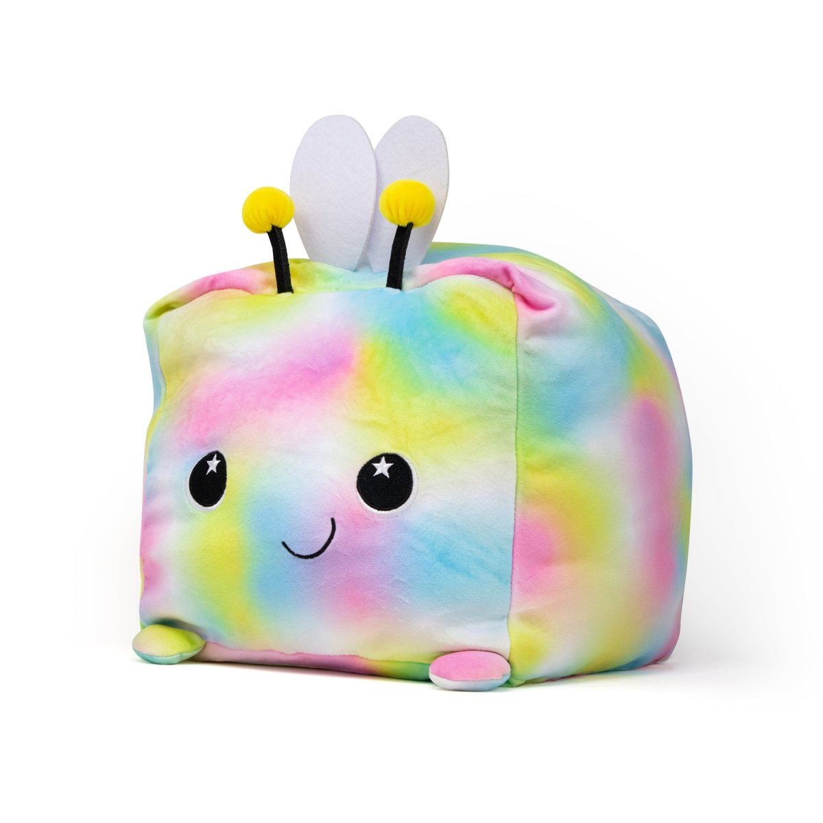 Flora the Bee Plushie is a cube-shaped, colorful plushie with cartoonish features and a tie-dye pattern in pastel blue, pink, yellow, and green. It includes soft stuffed material, two small wings, and antennae adorned with charming yellow spheres.