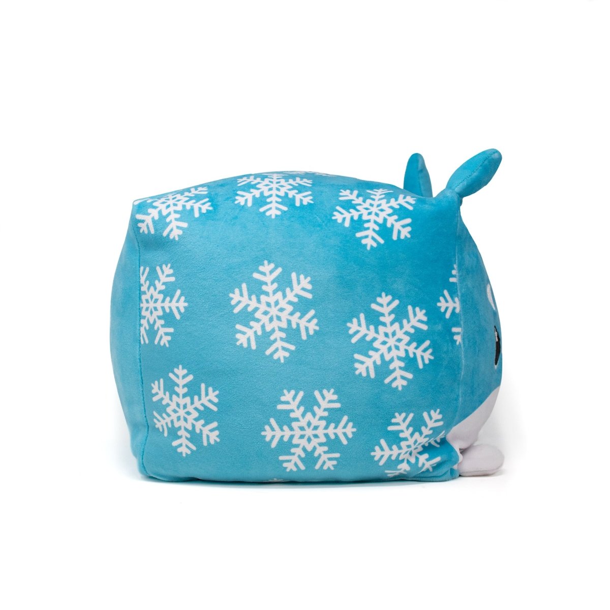 The Frost Plushie is a blue, square-shaped Moosh-Moosh Squared2 shiba inu plush with white snowflake patterns and small ears, shown from the side.