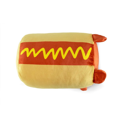 Gilbert the Hotdog Plushie is a cute pillow shaped like a hot dog, complete with a wavy yellow mustard line and orange ends resembling sausage tips. Its playful design adds a whimsical charm to any room.