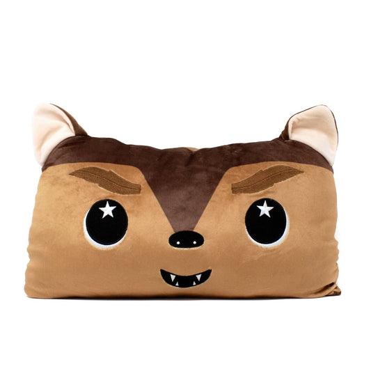 The Raegan the Werewolf Pillow is an adorable rectangular plush with a cartoon raccoon face featuring starry eyes, a small black nose, two sharp teeth, and plush ears. Its cute brown and tan design makes it perfect for fans of cuddly creatures.