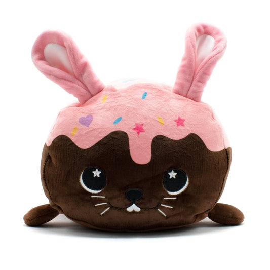 Harry the Bunny Plushie boasts chocolate brown fur, pink frosting on top with sprinkles, and long pink bunny-like ears. It features starry eyes, a small nose, and a tiny mouth for an adorable look.