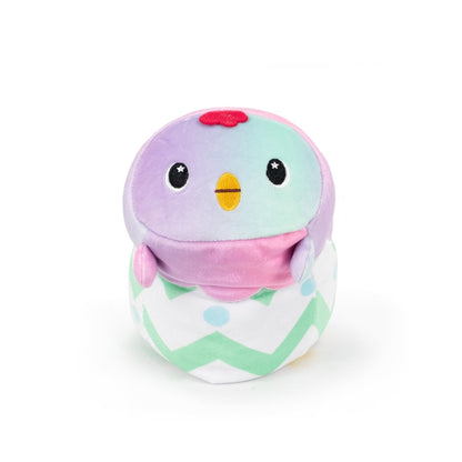 Introducing Frederick the Chick Hatchling, an adorable ultra-soft plush bird perfect for your Easter Basket Buddies collection. With a purple and teal head, big eyes, and a small red crest, this plush features a round pink and white body with a charming green zigzag pattern.