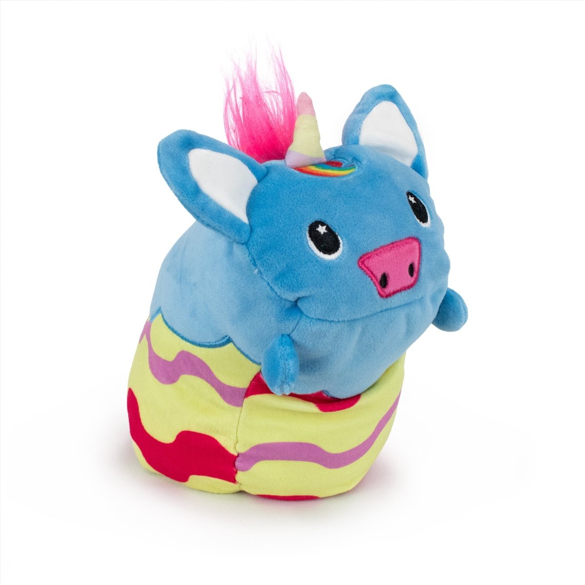 Meet Sparkle the Unicorn Hatchling, your ultra-soft huggable buddy with a blue body, pink snout and ears, yellow horn, and red, yellow, and green wavy patterns—a unique blend of a unicorn and pig for your Easter Basket Buddies collection.