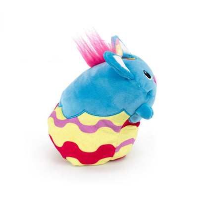 Sparkle the Unicorn Hatchling is a plush toy shaped like an egg, made from ultra-soft materials. It has a blue body, pink nose, vibrant red, yellow, and purple stripes, small blue ears, and a pink tuft of hair—perfect for an Easter Basket Buddy with its adorable expression.