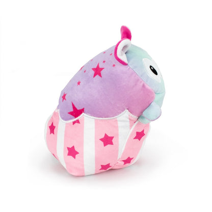 Comet the Alpaca Hatchling is a colorful stuffed toy with a blue face, large eyes, a pink and white striped body, purple back with pink stars, and small ears. Its sensory softness makes it ideal for Easter Basket Buddies, resting against a plain white background.