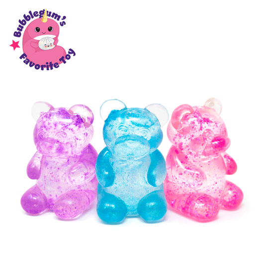 Three translucent, bear-shaped toys in purple, blue, and pink stand side by side. A pink cartoon bear logo with the text “Bubblegum’s Favorite Toy - Glitter Maltose Bears” appears in the top left corner. Each adorable Glitter Maltose Bear doubles as a sensory squishie and stress relief toy—perfect for squeezing the day away.