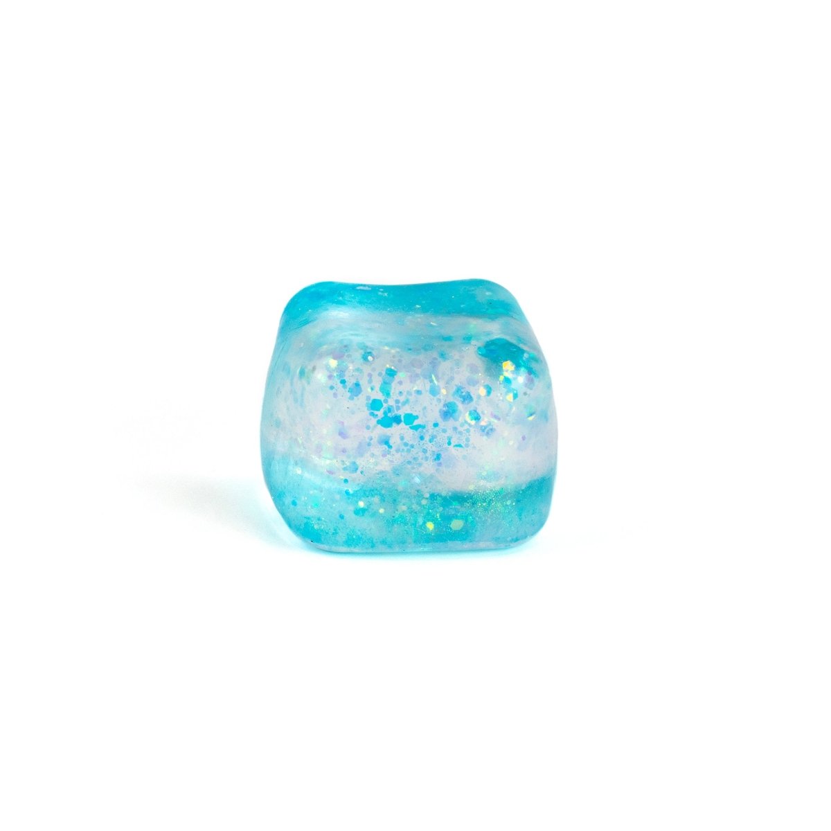 Bubblegum's Favorite Toy - Glitter Sugah-mals Cubes: a translucent blue squishy cube with glitter and iridescent flecks, perfect as a stress relief toy or decorative piece, shown on a white background.