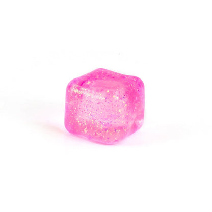 A single pink, translucent Glitter Sugah-mals Cube from Bubblegum's Favorite Toy, sparkling with glitter inside like jelly or a decorative stress relief toy, is shown against a plain white background.