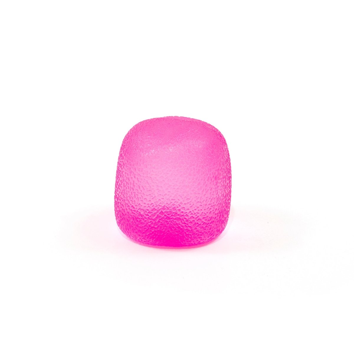 A single bright pink, translucent, textured cube from Bubblegum's Favorite Toy - Sugah-mals Gumdrops is centered on a plain white background as an appealing sensory squishies stress relief toy.