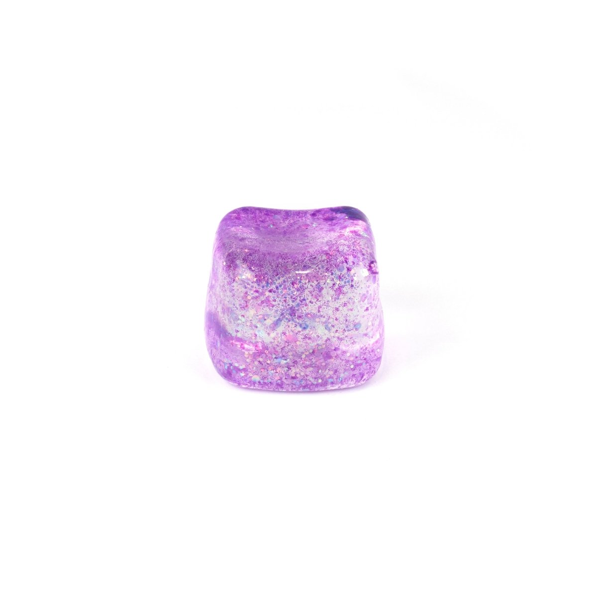 A single translucent purple Bubblegum's Favorite Toy - Glitter Sugah-mals Cube v.2 with sparkly glitter inside rests on a plain white background—perfect for stress relief.