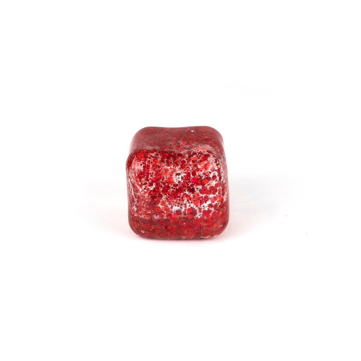 A single Bubblegum's Favorite Toy - Glitter Sugah-mals Cubes v.2 is centered on a white background, showcasing its shiny red surface with irregular white and dark red specks—ideal for stress relief.