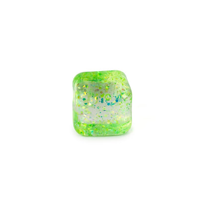 A single Bubblegum's Favorite Toy - Glitter Sugah-mals Cubes v.2, a translucent green cube with sparkling glitter and blue flecks inside, placed on a plain white background.