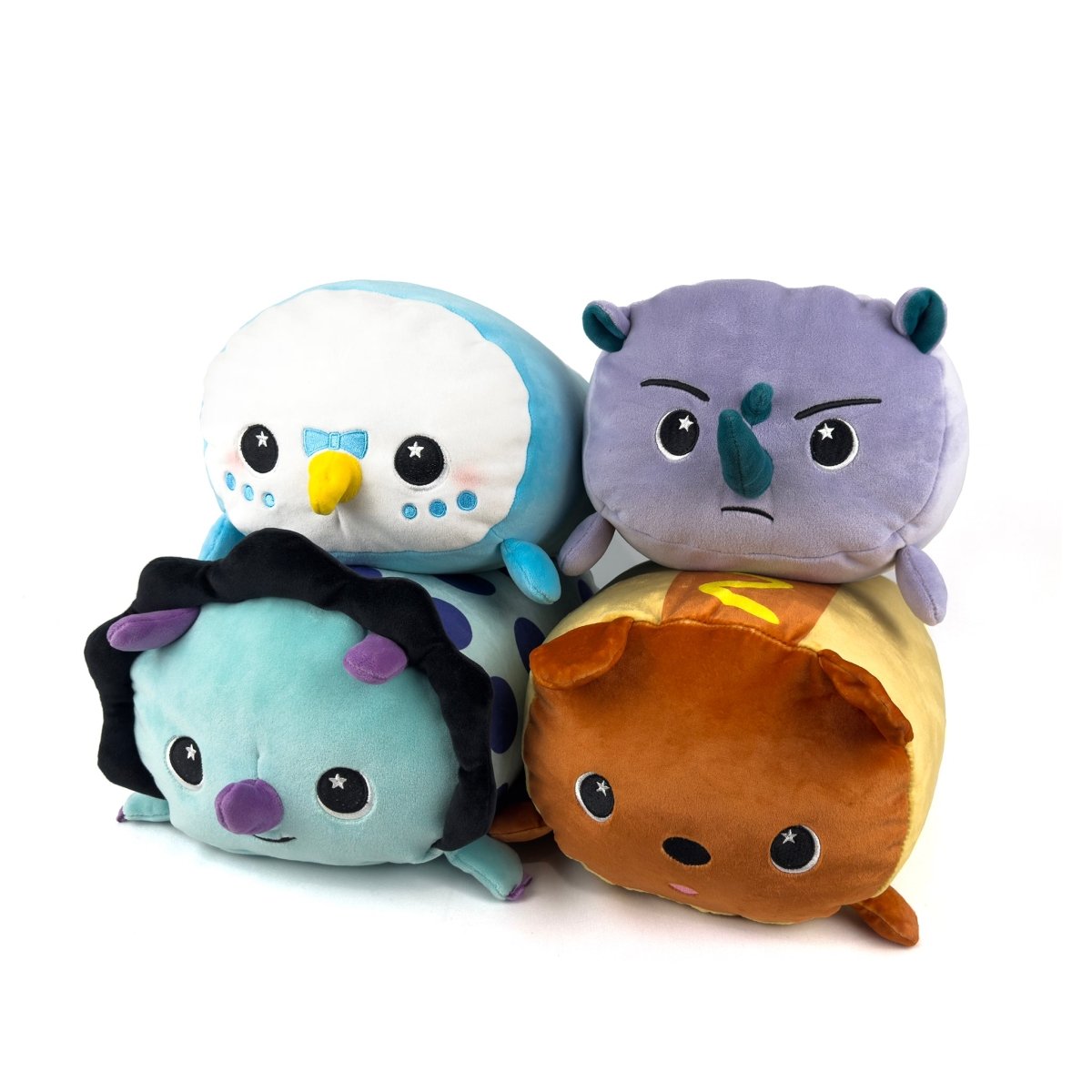 The Limited Edition Bundle - 4 Pack features four adorable Moosh-Moosh plushies—white owl, purple rhino, teal dinosaur, and brown bear—with cute faces, round bodies, and irresistibly soft textures for endless cuddling.