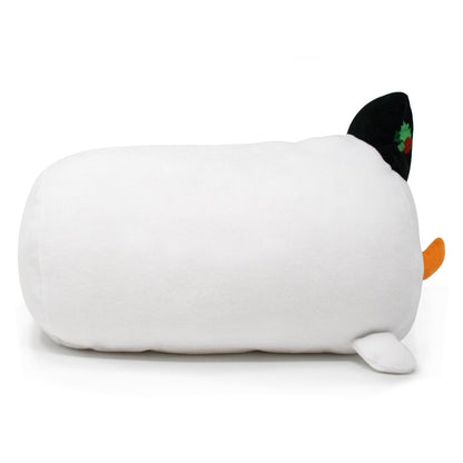 Jack the Snowman Plushie is a soft, white, cylindrical plush toy resembling a cartoon animal. It features a black ear, an orange carrot-like tail, and a charming leaf detail on its head. This cuddly stuffed animal sits against a plain white background.