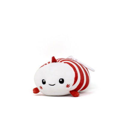 Mintie the Mint Clip-On, a plushie shaped like peppermint candy, features cheerful red and white stripes, a smiling face, and tiny limbs against a plain white background, enhancing its adorable charm.