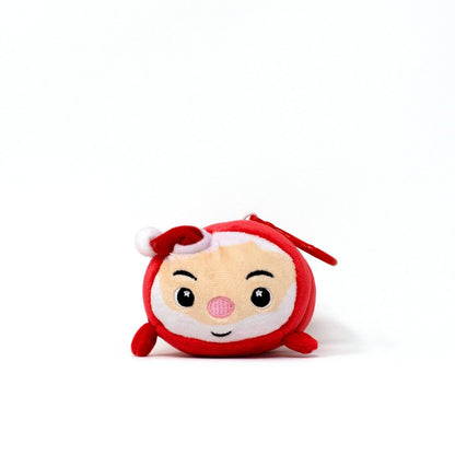 The Santa Clip-On is a round, plush toy with a red hat, white beard, and rosy cheeks—ideal as a festive Christmas plush or cute Santa keychain. Set against a plain white background.
