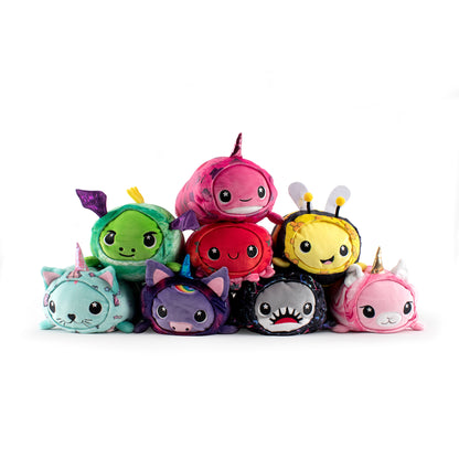 The Lucy Slumber Plushie collection features adorable plush toys stacked in two rows with designs like unicorns, bees, and sharks. Each has large eyes and cute expressions, making them perfect for adding a touch of whimsy to any space.