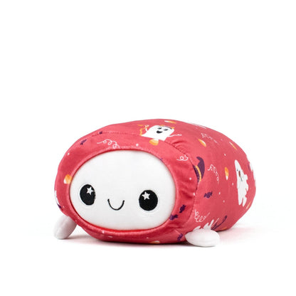 The Boo Spooky Slumber Plushie is a cute, round stuffed toy with ultra-soft material, a white face, starry black eyes, and a red body featuring Halloween designs like ghosts and candy. It has stubby limbs and a soft, friendly look.