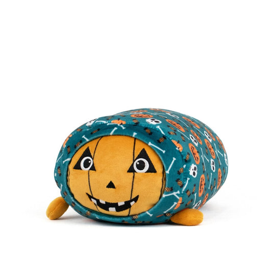 The Vincent Spooky Slumber Plushie is a pumpkin-shaped plush toy with a smiling jack-o’-lantern face, orange arms, and a teal body adorned with small orange pumpkins and white skulls. Made from ultra-soft materials; shown on a white background.