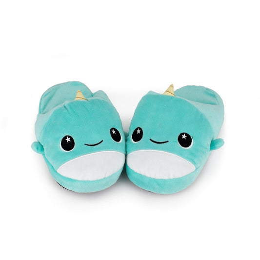 Minthe the Narwhal Kids Slipper—a pair of teal kids slippers shaped like cute narwhals, featuring smiling faces, starry eyes, white bellies, and yellow horns. Soft plush house slippers shown on a white background.