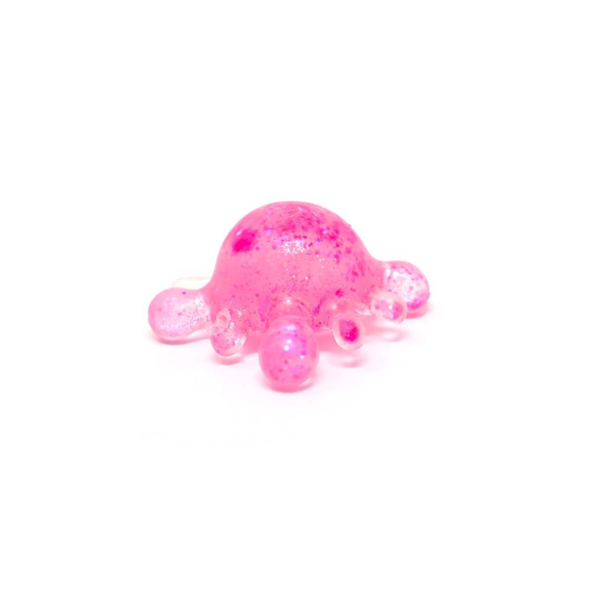Centered on a white background, Bubblegum’s Favorite Toy - Splat Squishy appears as a small, translucent pink blob with rounded protrusions, reminiscent of a sensory toy or abstract sculpture.