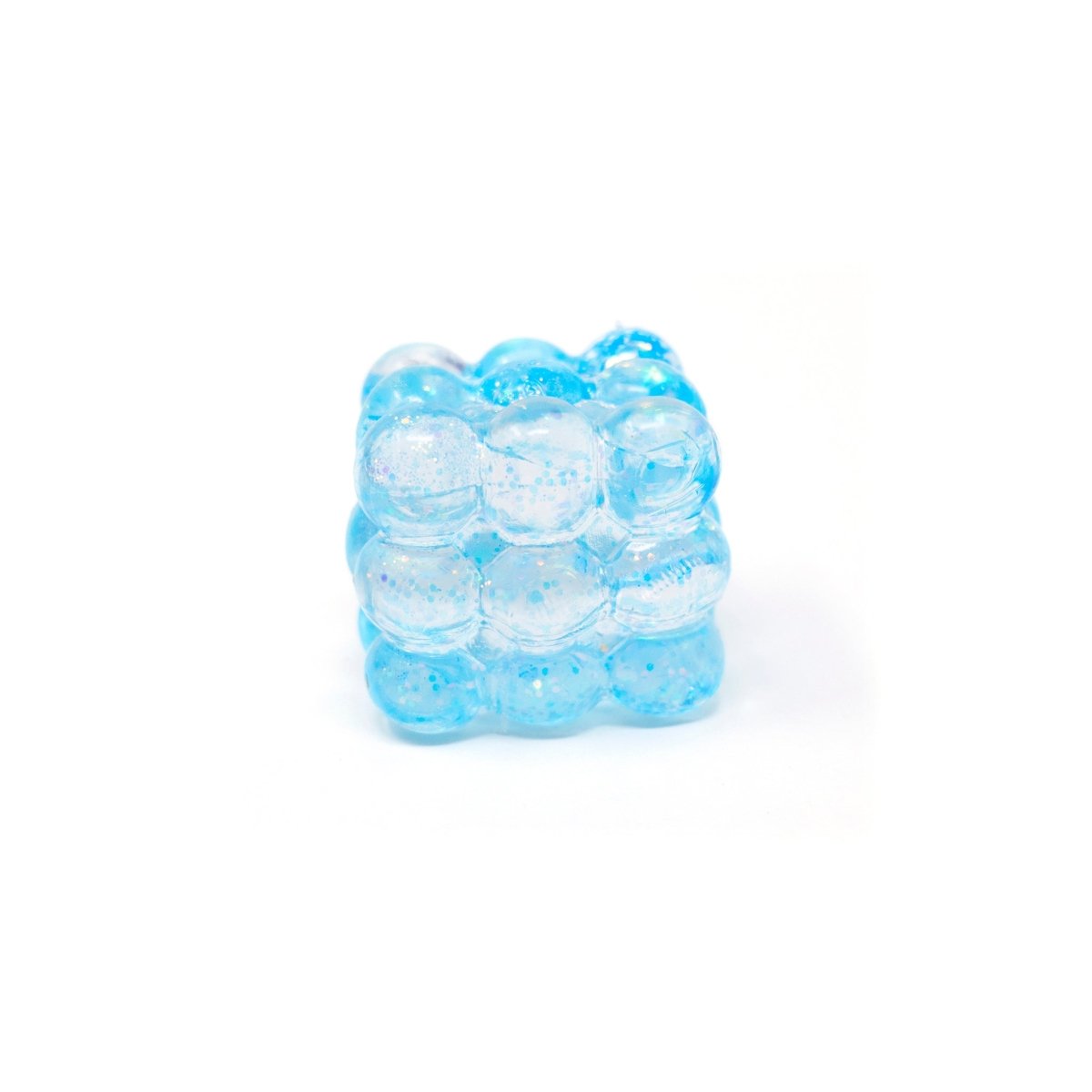 Bubblegum’s Favorite Toy - Glitter Bubble Cube: a translucent blue gel cube filled with tiny bubbles and sparkles, displayed on a white background.
