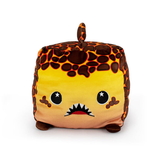 Pele the Lava Shark is a cube-shaped, machine-washable plush toy with a lava-like pattern, small brown feet, a top tail, big starry eyes, and a red mouth with sharp white teeth—perfect for any collection.