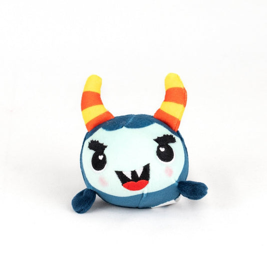 The Spike Spooky Plushy Skwishy is a round, blue plush toy with a light blue face, orange and yellow striped horns, black eyebrows, small fangs, blushing cheeks, and tiny flipper-like arms set against a white background.