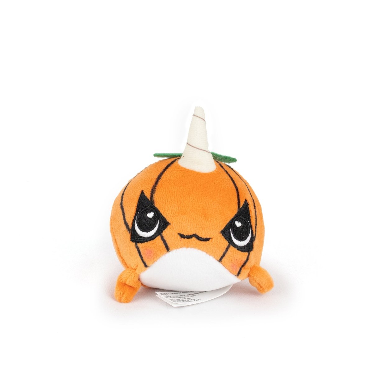 Vincent Spooky Plushy Skwishy is a round, orange plush toy with big black eyes, a small smile, a white belly, and a cream-colored horn topped with green felt leaves, making it look like an adorable pumpkin.
