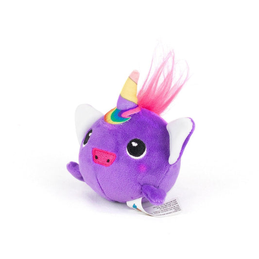 Amethyst Spooky Plushy Skwishy is a round, purple plush unicorn with big black eyes, a rainbow horn, pink cheeks, white ears, pink tufted hair on top, and a tag at the bottom. It's shown sitting on a white background.