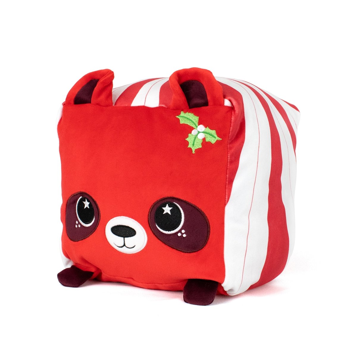Quincy the Raccoon is a plush toy with big shiny eyes, small dark red paws, red-striped sides, upright red ears, and a green holly leaf on its head. This cuddly toy is machine washable for easy care.