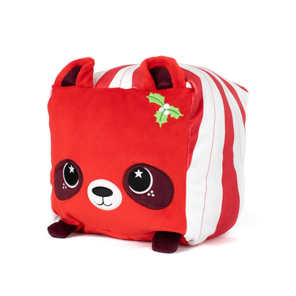 Quincy the Raccoon is a plush toy with big shiny eyes, small dark red paws, red-striped sides, upright red ears, and a green holly leaf on its head. This cuddly toy is machine washable for easy care.