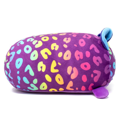 Rayn the Leopard Plushie is a cute, colorful, whimsical hippo-like pillow. The plush body is purple with rainbow leopard spots, featuring small blue ears and a purple tail. This soft pillow has a round, huggable shape.