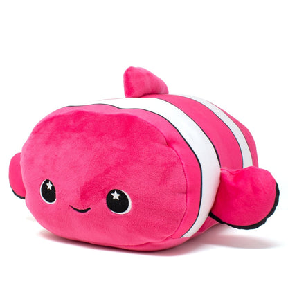 Skipper the Clownfish Plushie is a soft toy designed as a pink clownfish with white stripes. It has a smiling face and sparkling eyes, all in a rounded, cushion-like shape.