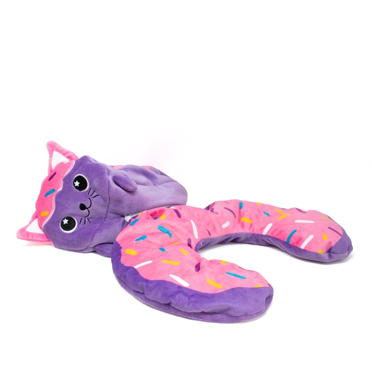 Meet Freckles the Doughnut Cat 2-In-1 Travel Pillow: a plush neck pillow with a purple body and pink donut-shaped torso, decorated with colorful sprinkles. Its big eyes, smiling face, and pink ears make it both cute and sensory-friendly for travel comfort.