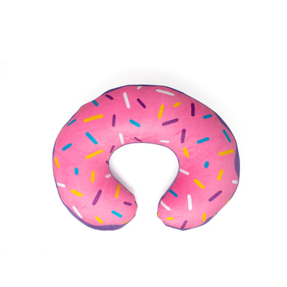 Freckles the Doughnut Cat 2-In-1 Travel Pillow, sensory-friendly and plush, features a pink donut design with vibrant sprinkles, set against a plain white background—an ideal and comfy travel companion.